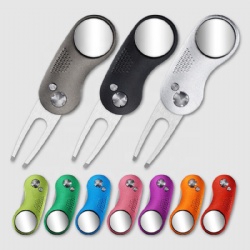 Switchblade golf divot tool with ball marker