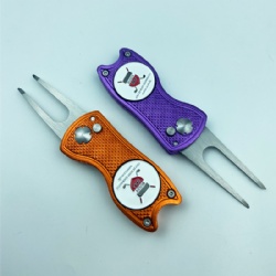 Golf divot repair tool with ball marker