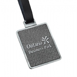 Old metal bag tag